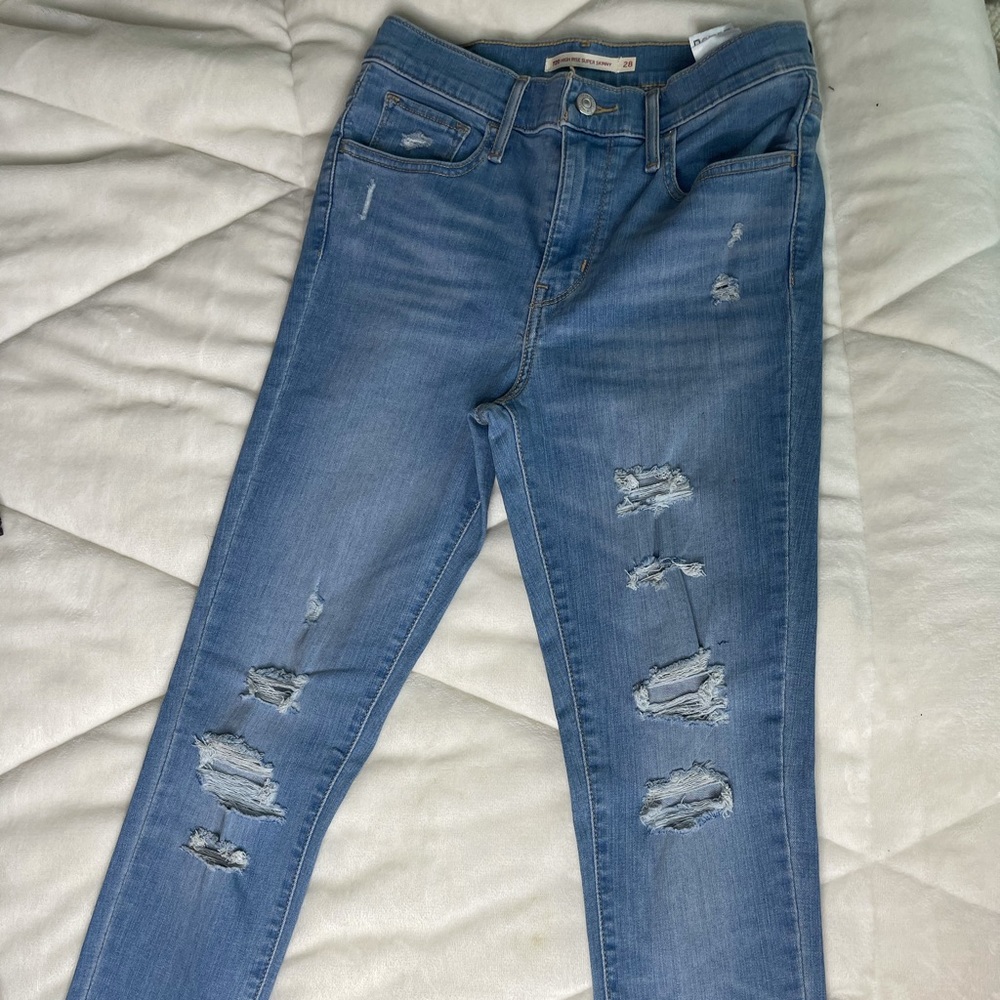 720 High Rise Super Skinny Levi